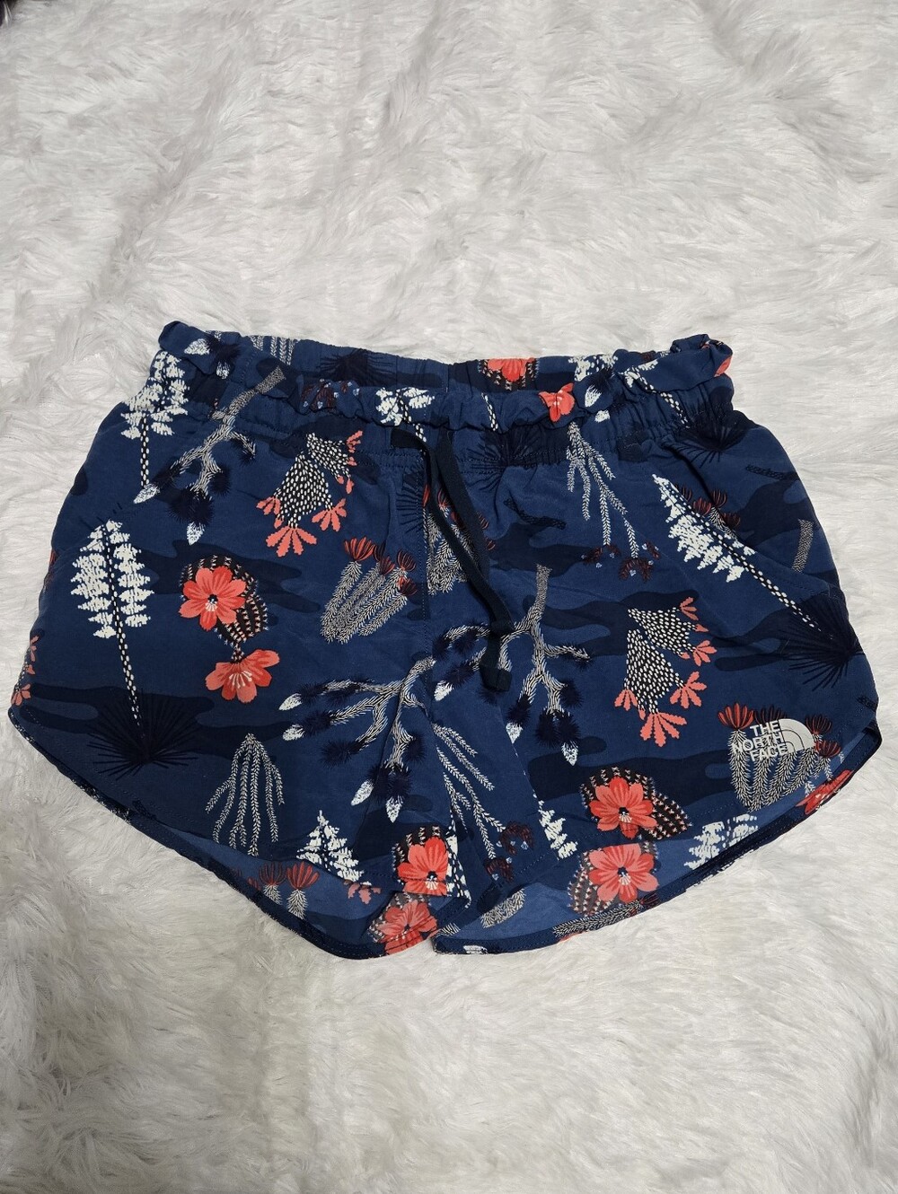 The North Face Navy Floral Shorts with Coral Accents